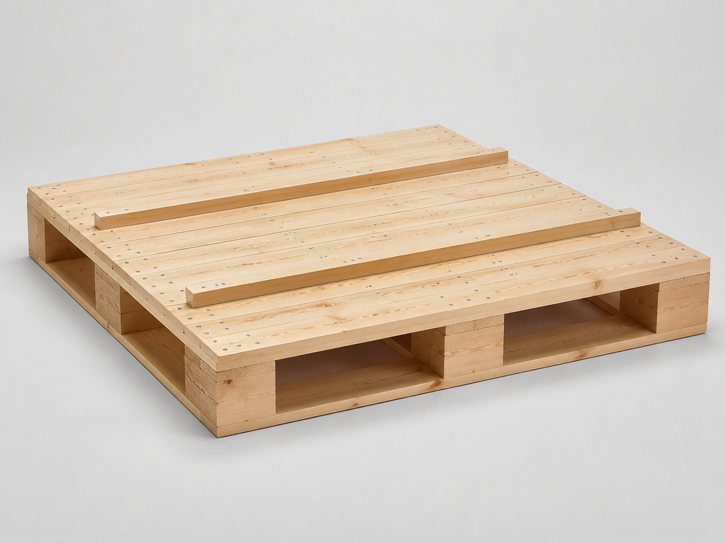 Illustrative studio image of a custom full-deck timber pallet built on block runners
