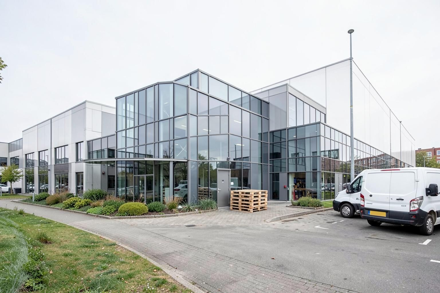 A Bracknell business park with a small pallet stack at a service door