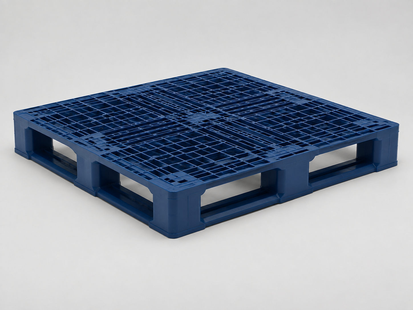 Illustrative studio image of a blue injection-moulded plastic pallet with a grid deck on a full perimeter runner base